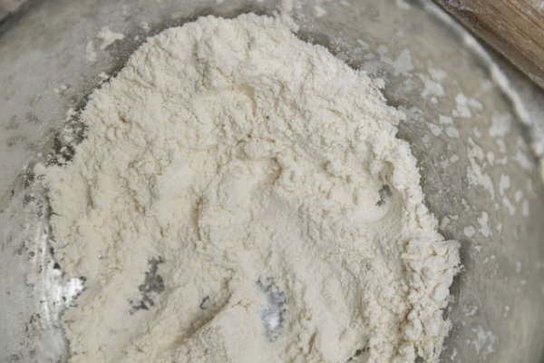 Bowl of flour on a table