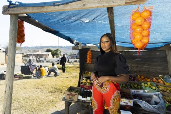 Black woman at the fruit market