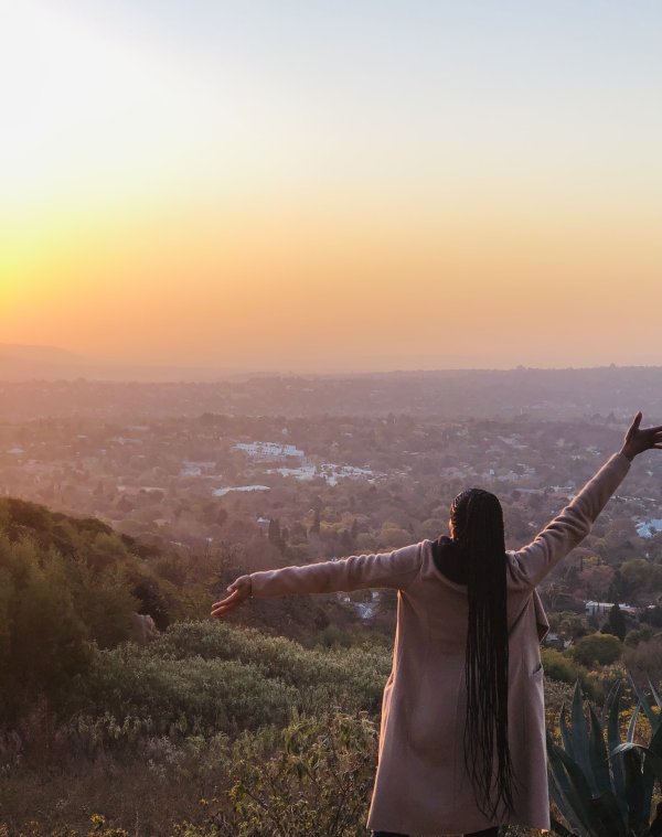 Black girl watching the sunset