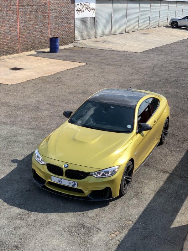 BMW M4 yellow car
