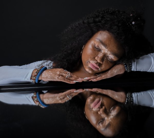 Beautiful model posing with mirror