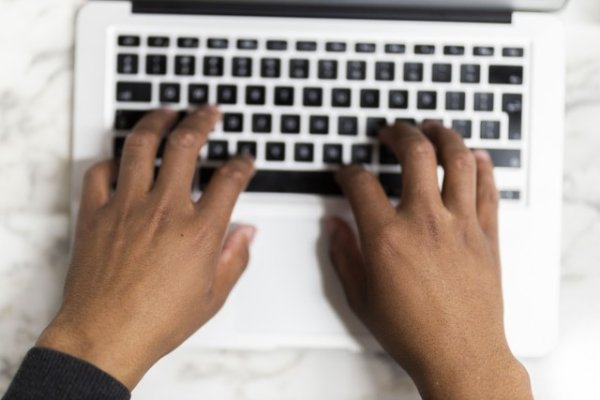 Black man working on his laptop