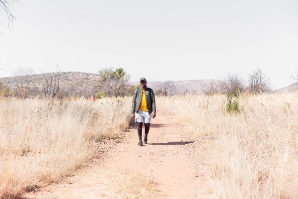 Black male hiking in the sun