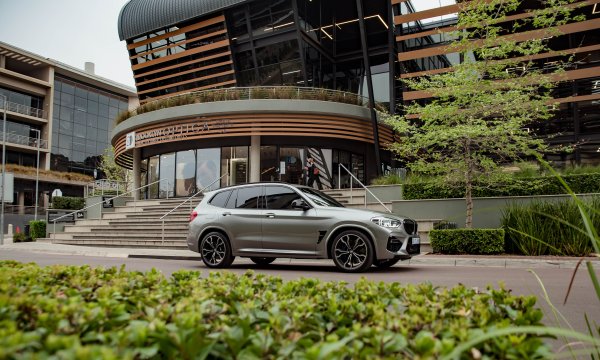 BMW X3 parked outside the office building