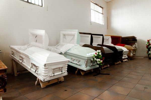 Funeral caskets in a row