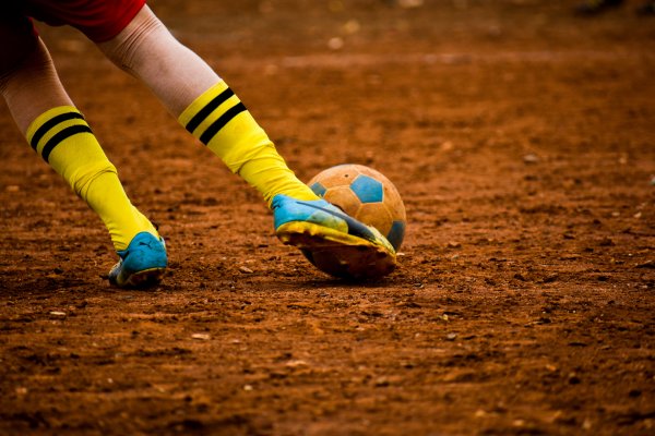 Goal kick in the dust