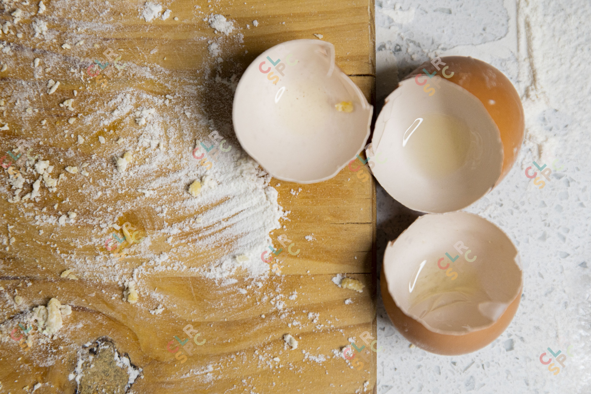 Egg shells on a table with flour