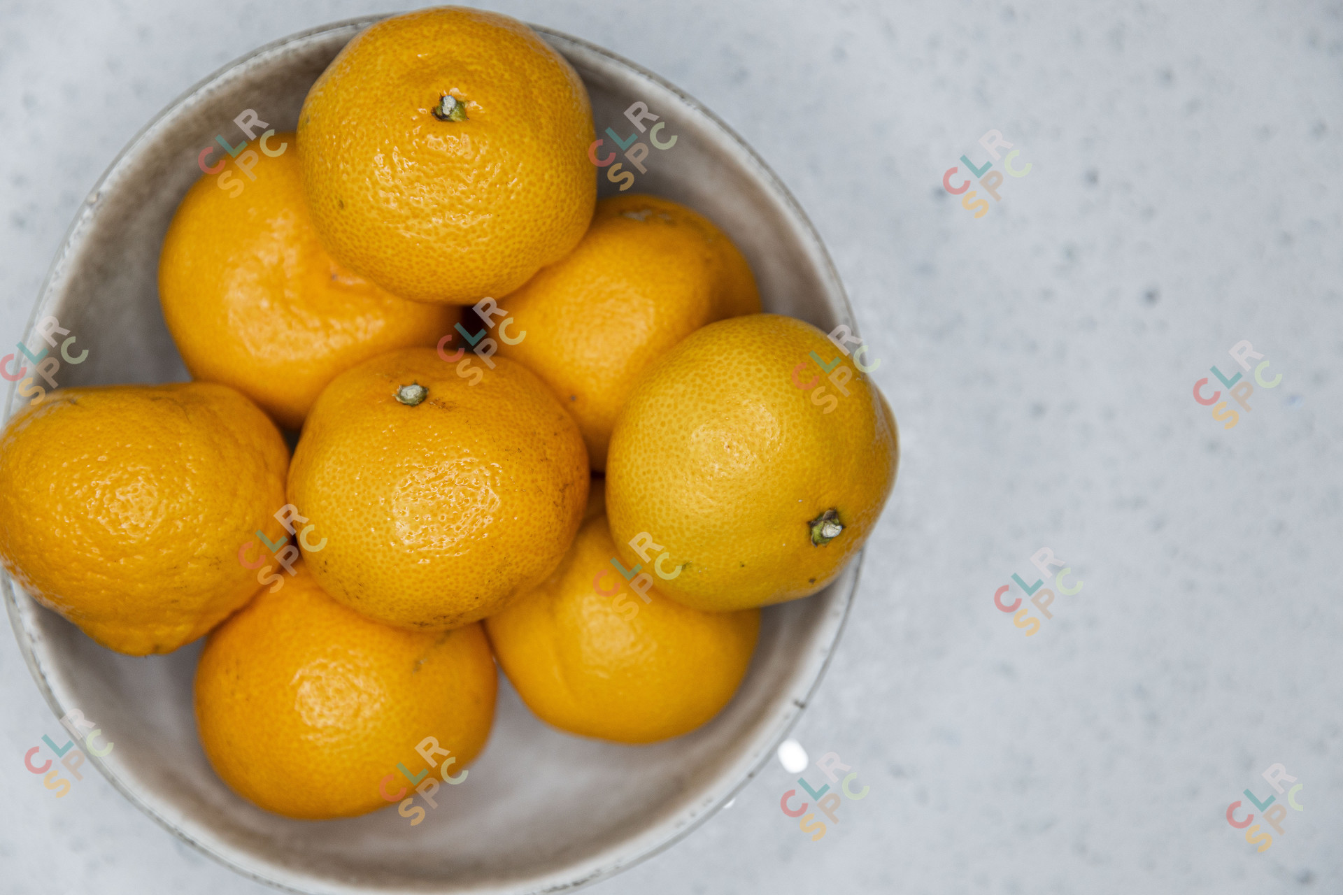 Oranges in a big bowl