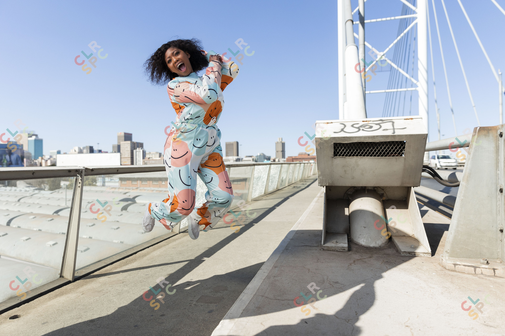 Black woman jumping for joy