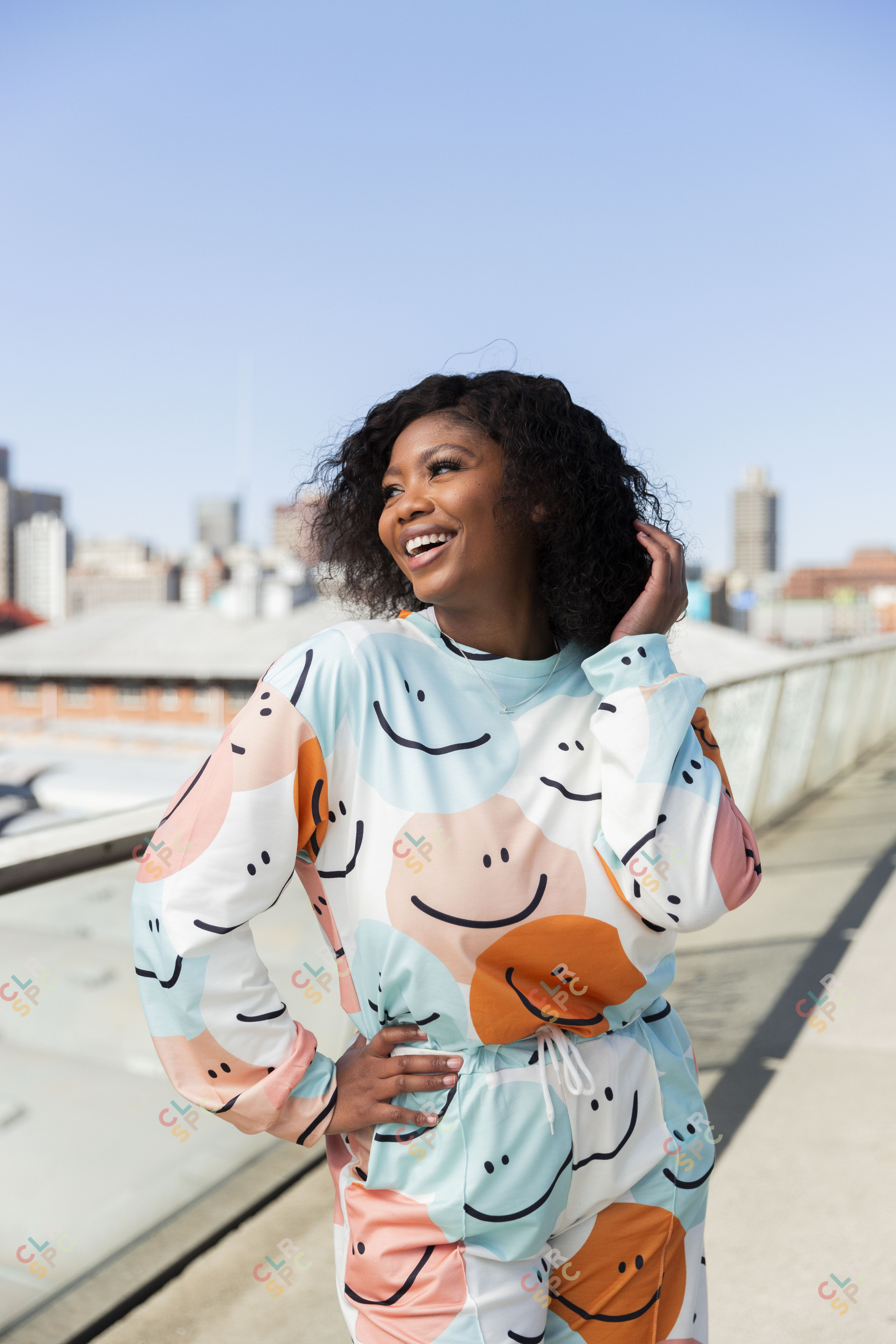 Black woman in the city smiling