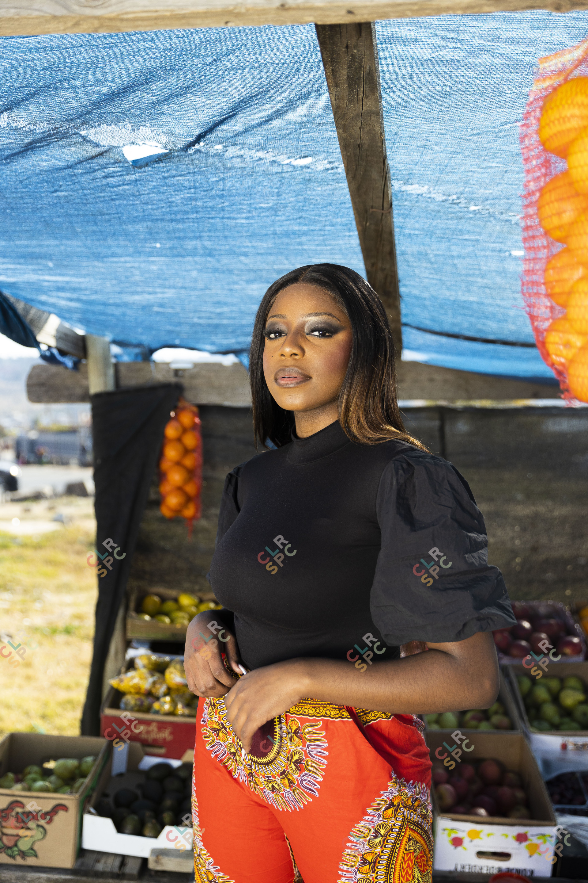 Black woman at the market posing