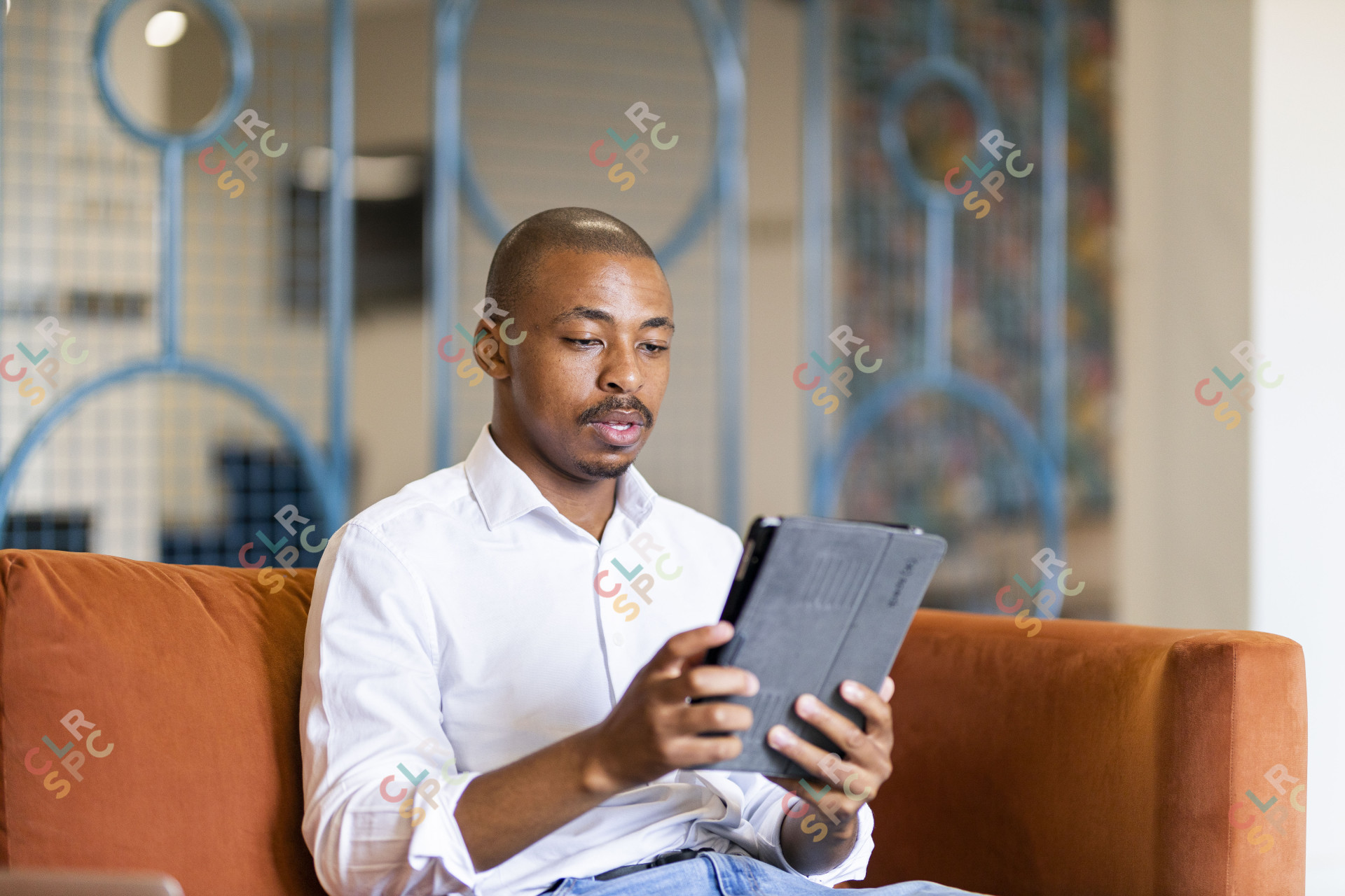 Black business man working on ipad