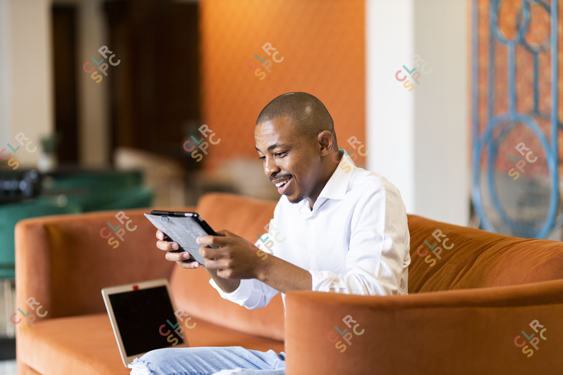 Black man working on ipad