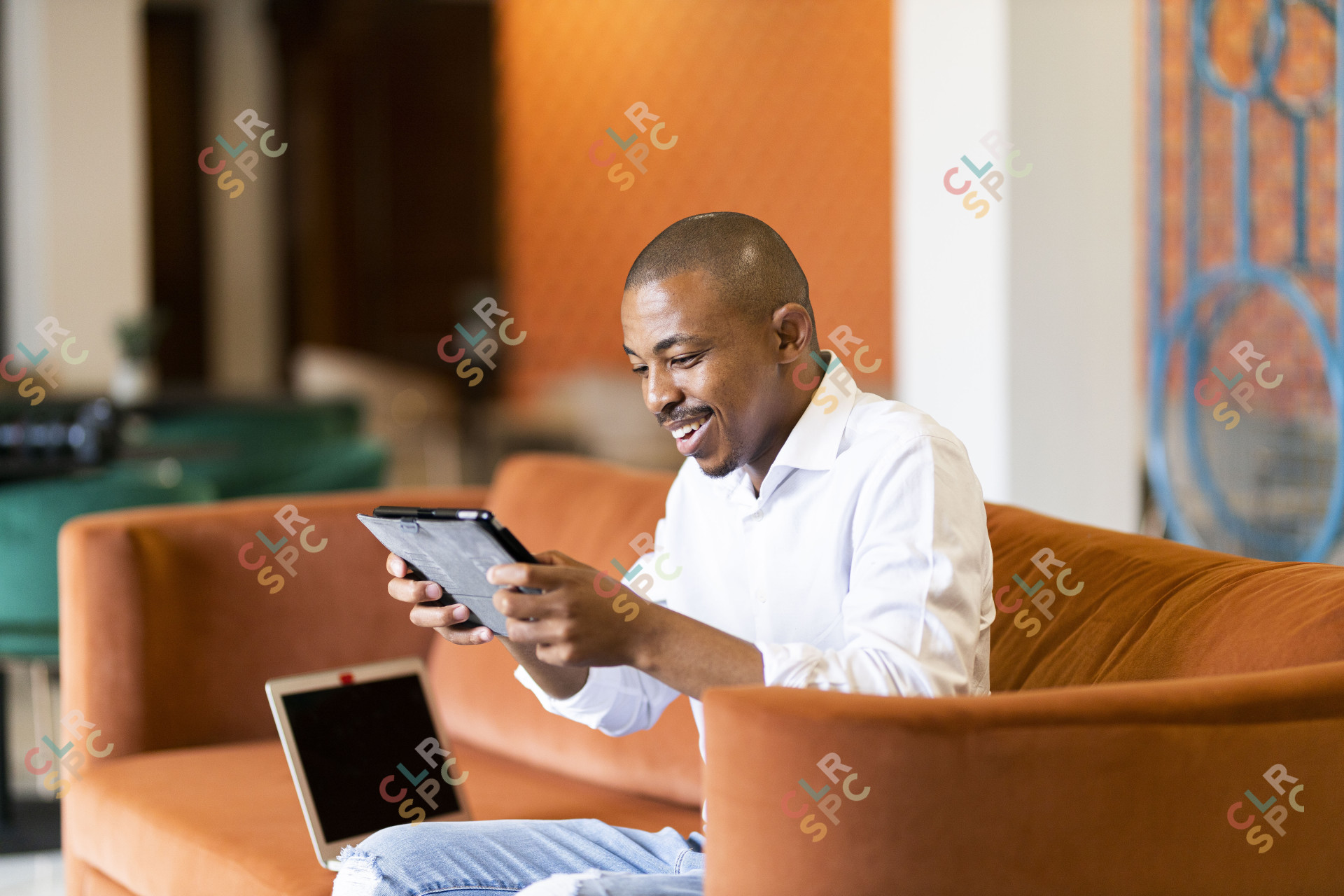 Black man working on ipad