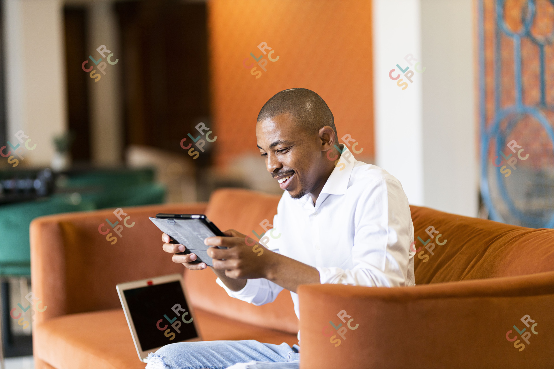 Black man working on ipad