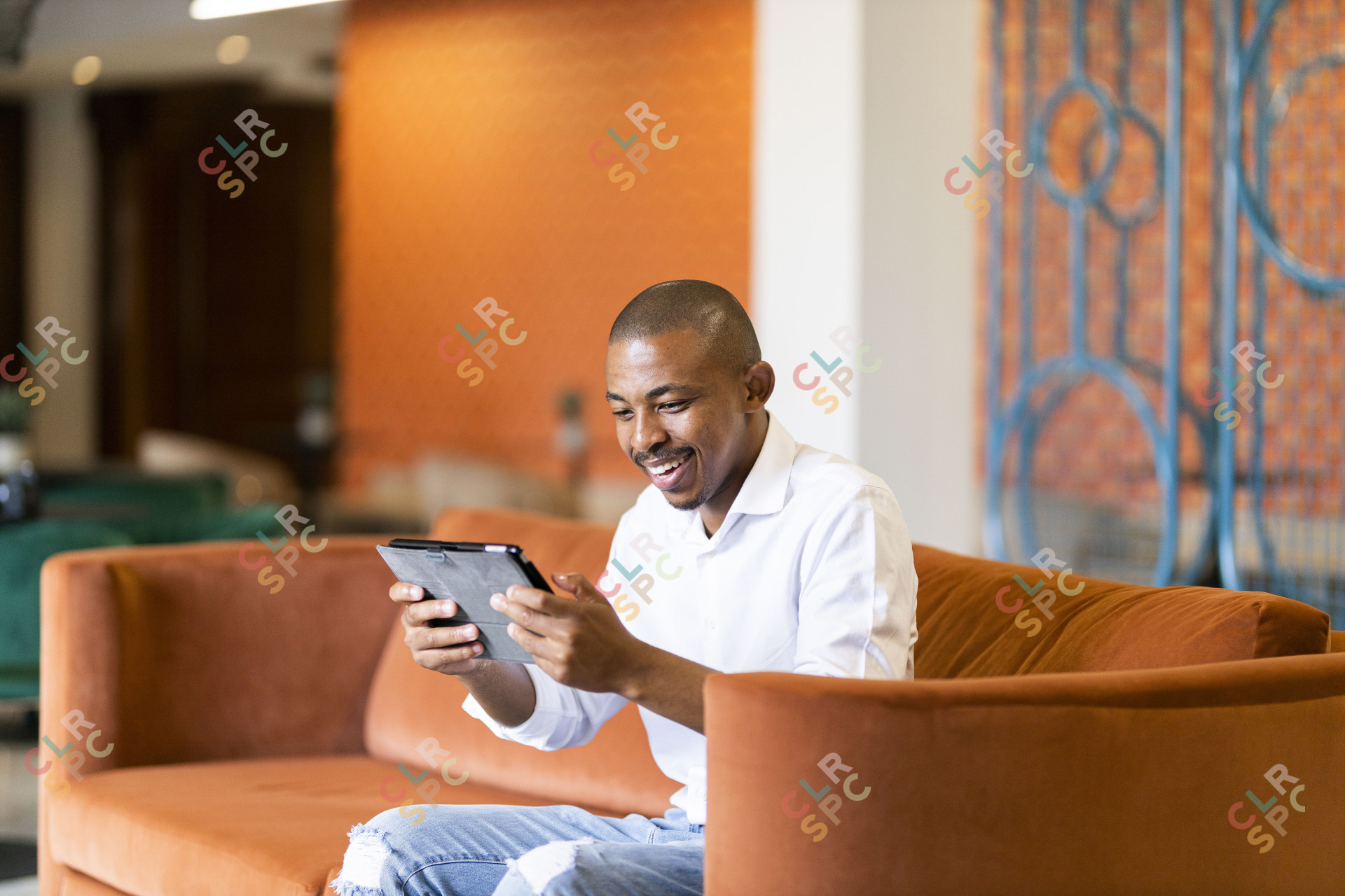 Black man working on ipad