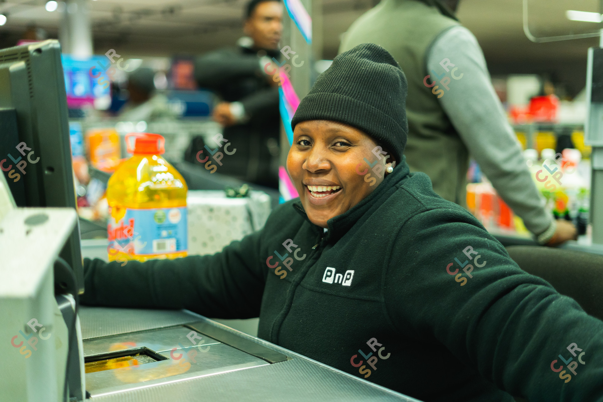 Pick n Pay employee at a teller.