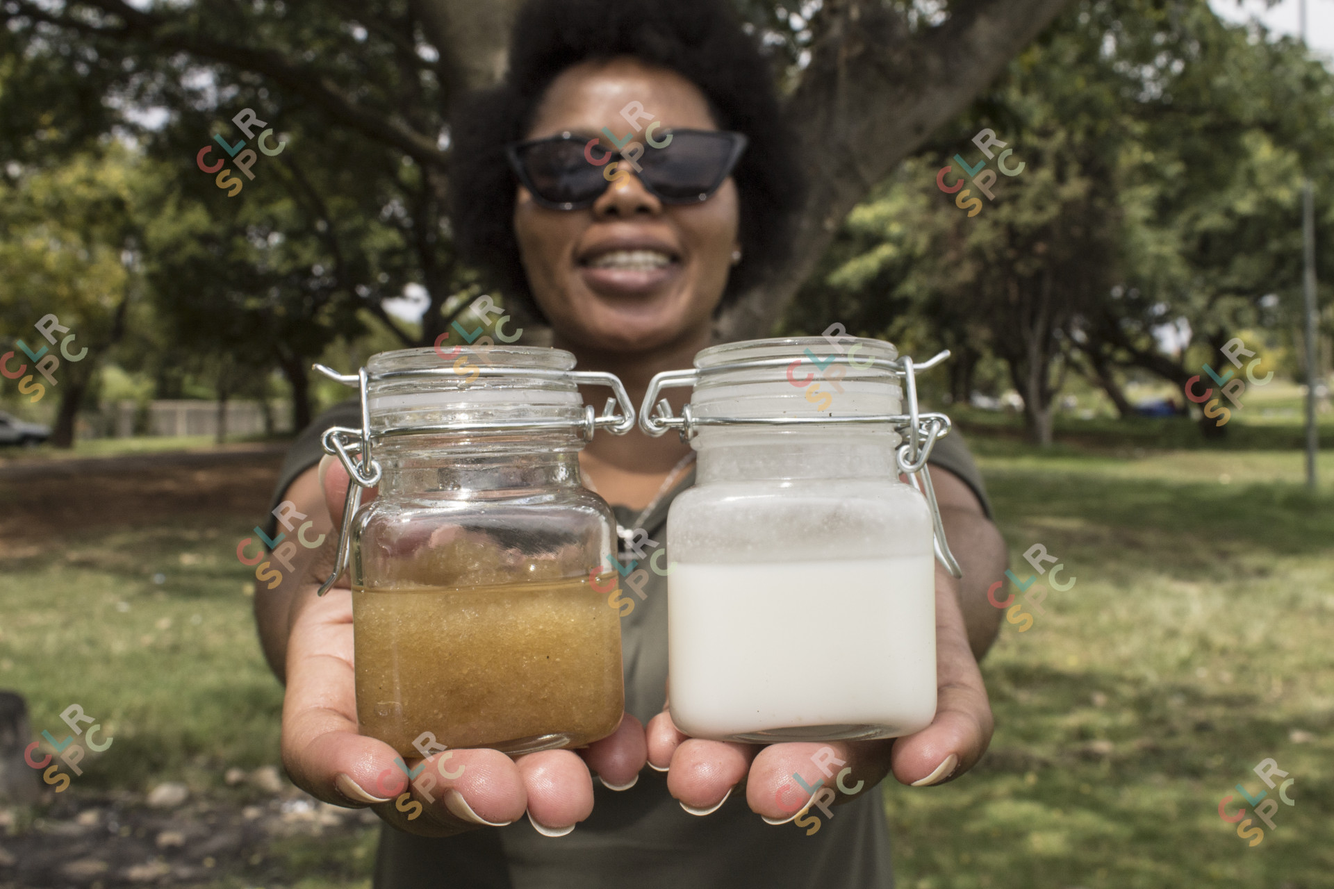 Woman presents cosmetic products on her hands