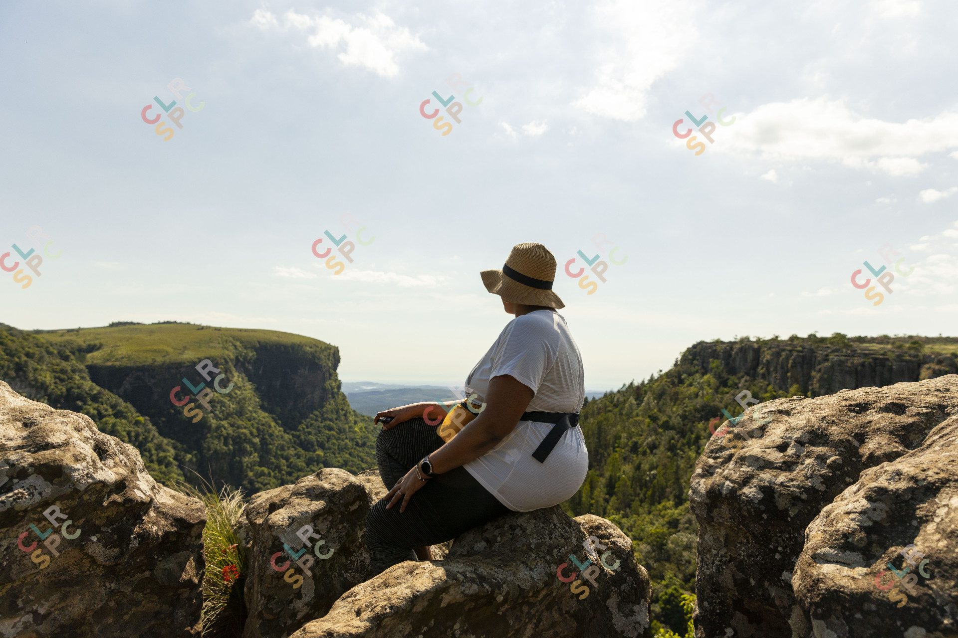 Black woman watching the view of Mpumalanga