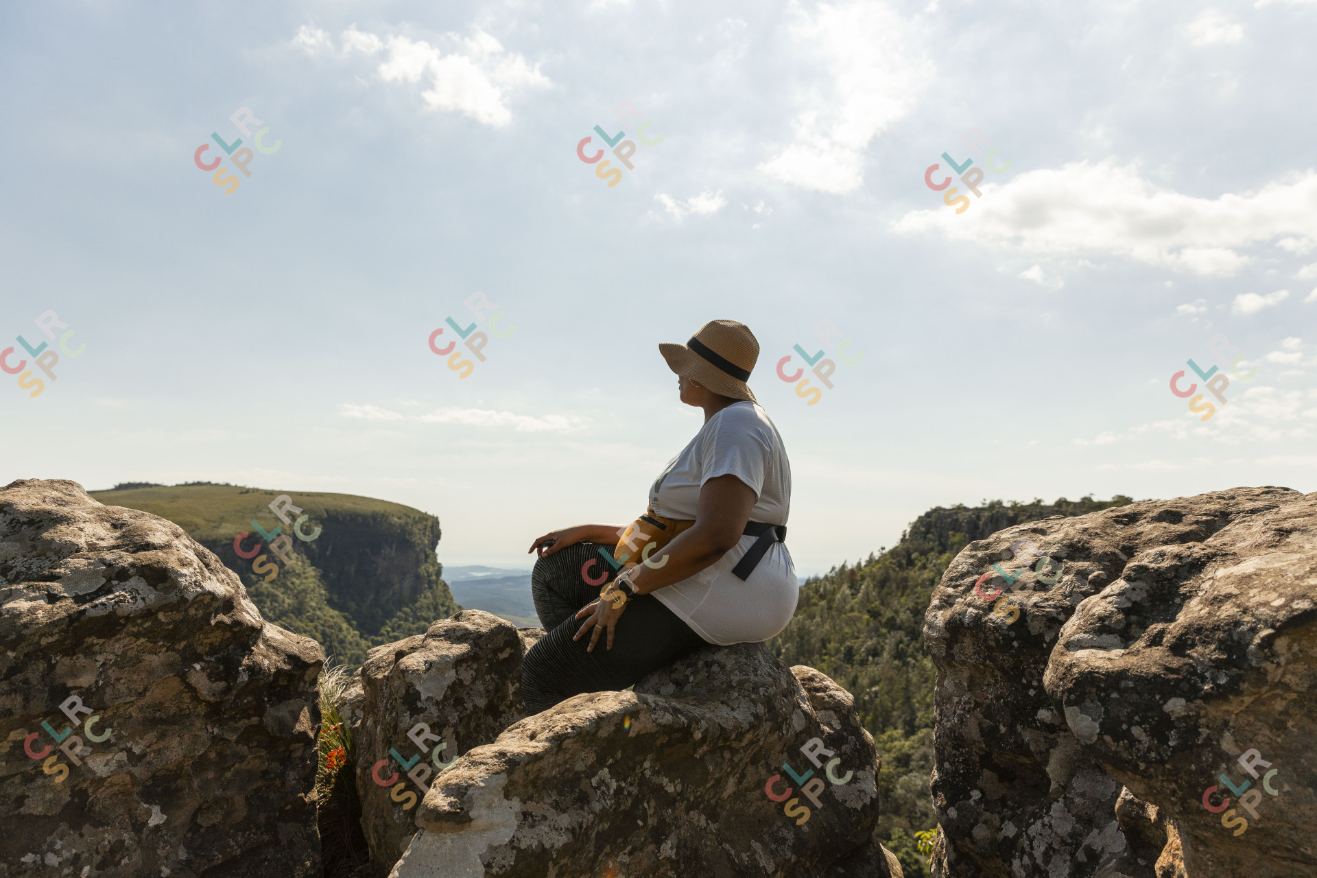 Black woman watching the views of Mpumalanga