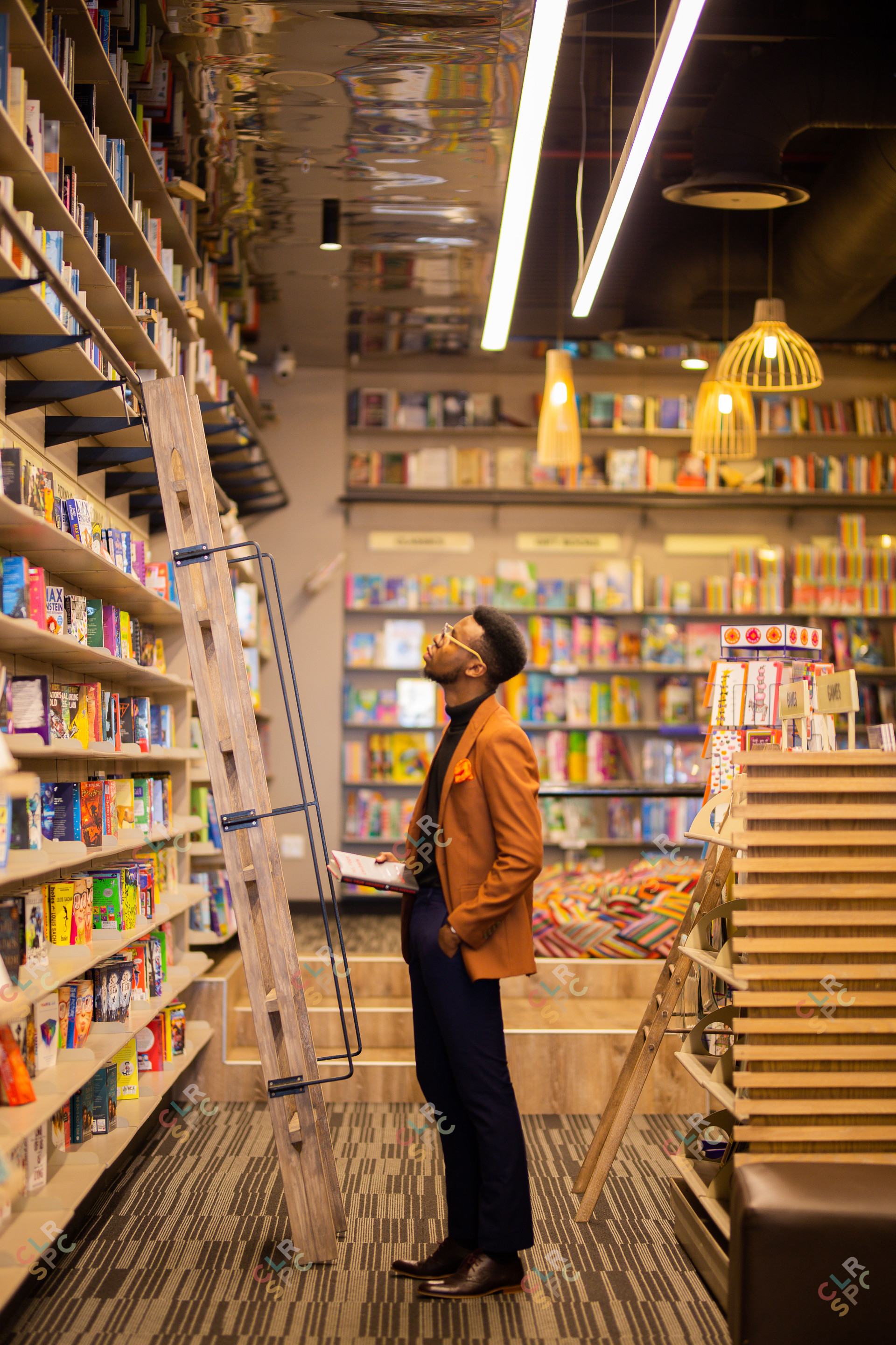 Black male looking at books