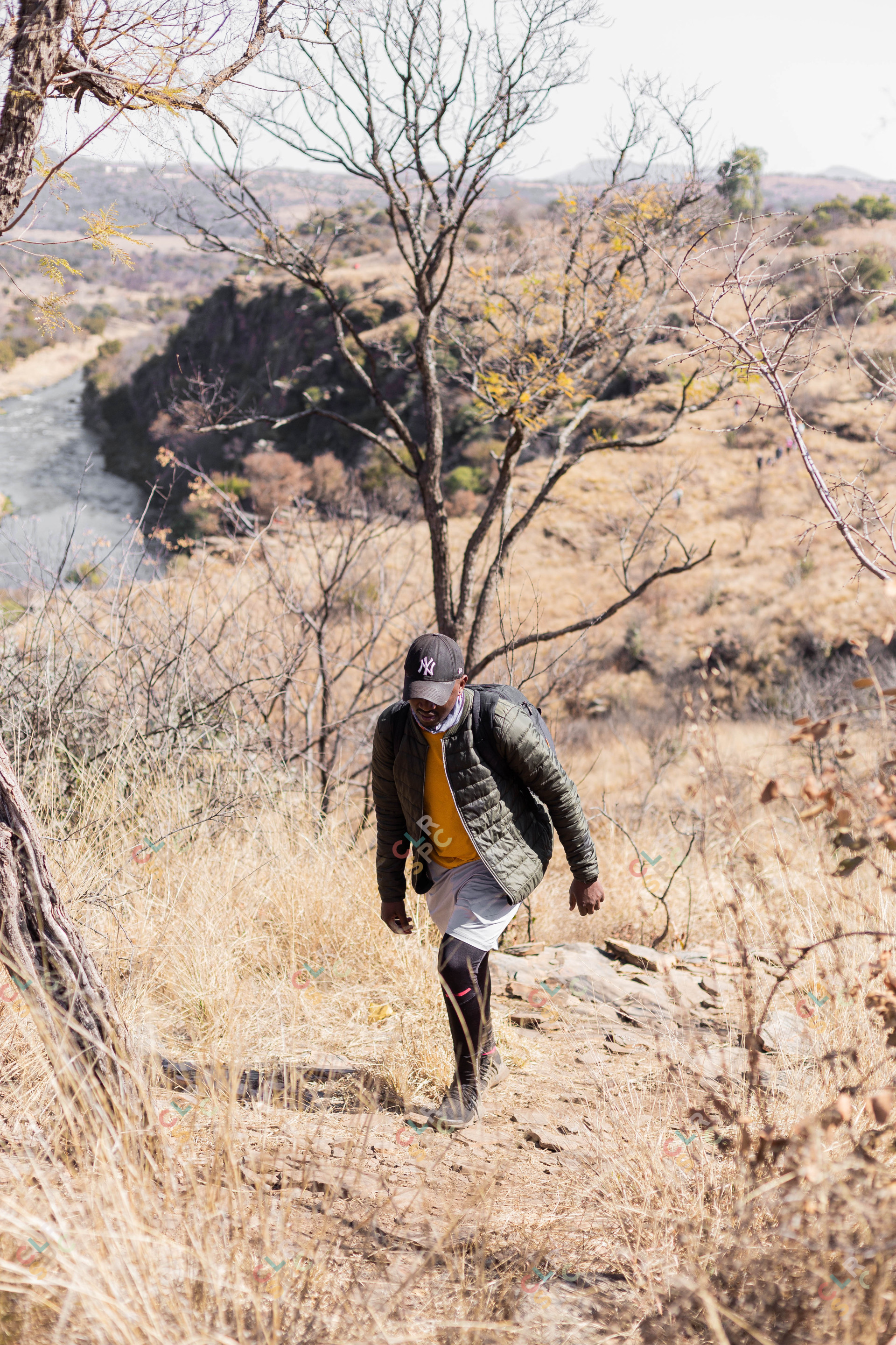 Black male hiking in the sun