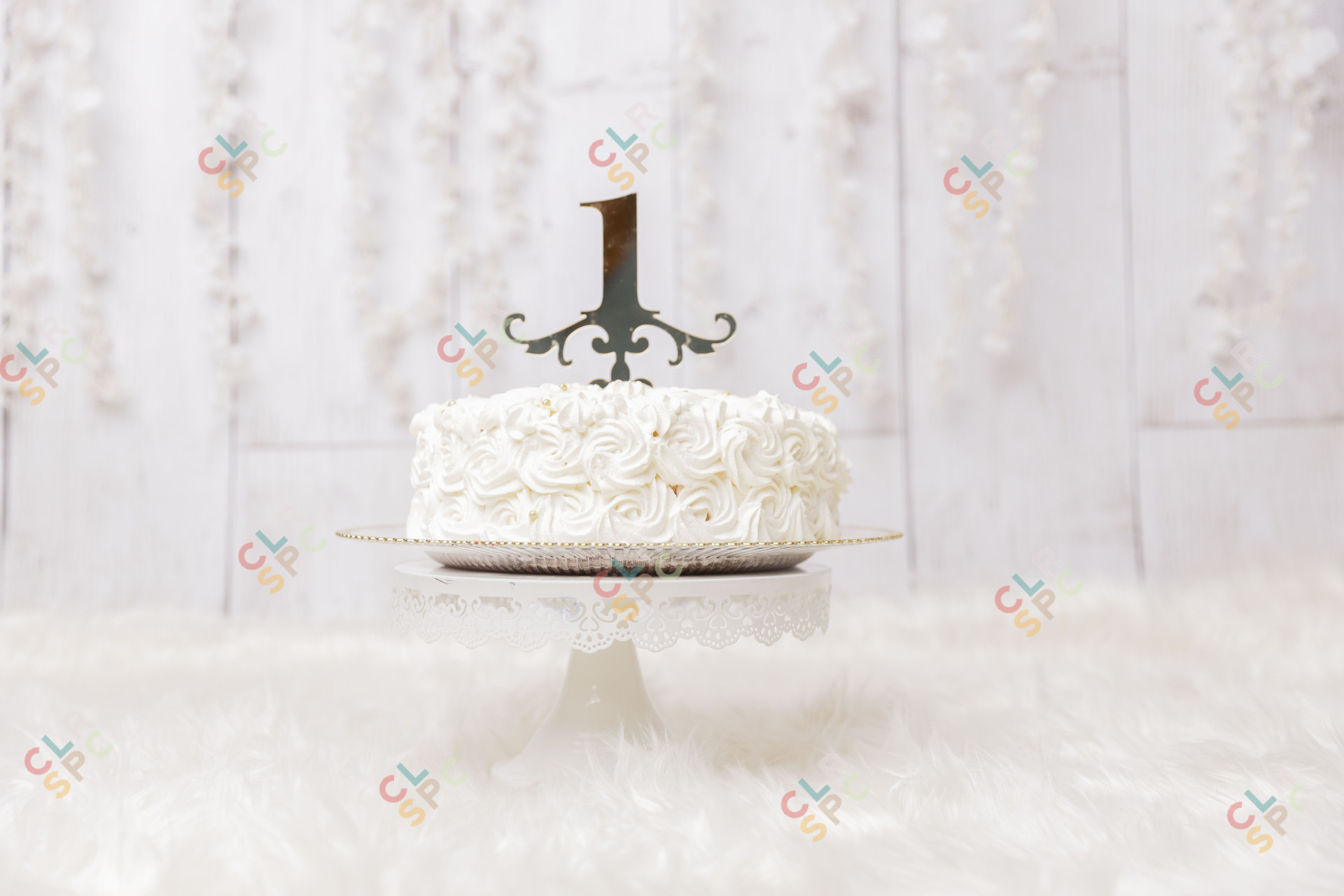 1st birthday cake on a stand